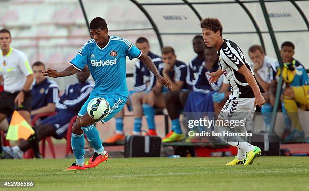 Patrick Van Arnnholt of Sunderland takes on Rondon of CD National during a pre-season friendly match between CD National and Sunderland at the...