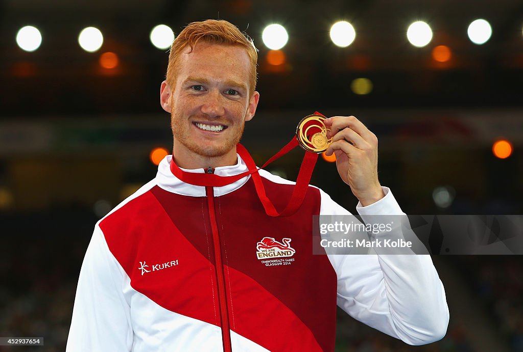 Greg Rutherford Podium Gold medallist Greg Rutherford of England poses on the podium during ...