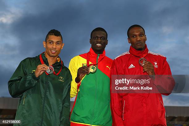 Silver medallist Wayde van Niekerk of South Africa, gold medallist Kirani James of Grenada and bronze medallist Lalonde Gordon of Trinidad and Tobago...