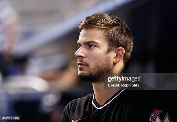 Brad Hand of the Miami Marlins looks on from the dugout during the game against the Washington Nationals at Marlins Park on July 30, 2014 in Miami,...