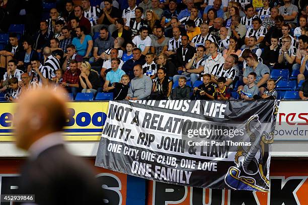 Newcastle United fans display a banner in memory of John Alder and Liam Sweeney who were involved in the Malaysian Airlines MH17 flight tragedy...