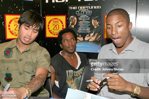Chad Hugo, Q-Tip and Pharrell Williams during Neptunes Present...Clones Album Signing in New York City on August 19, 2003 at Tower Records, Broadway...
