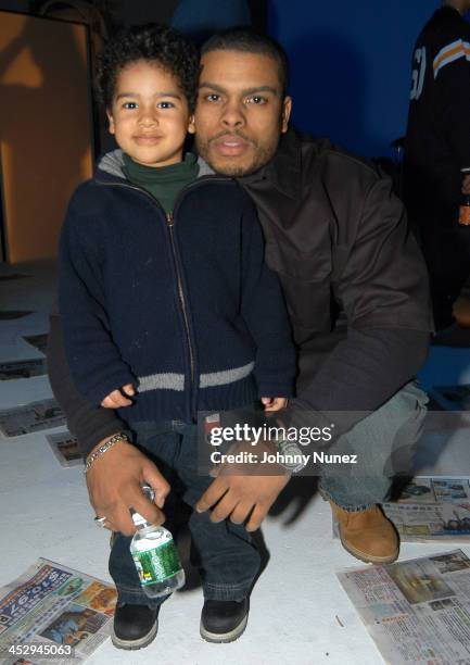 Julian Douglas and his father Benny Boom during Kanye West's College Dropout Video Shoot at Cinema World in Brooklyn, New York, United States.