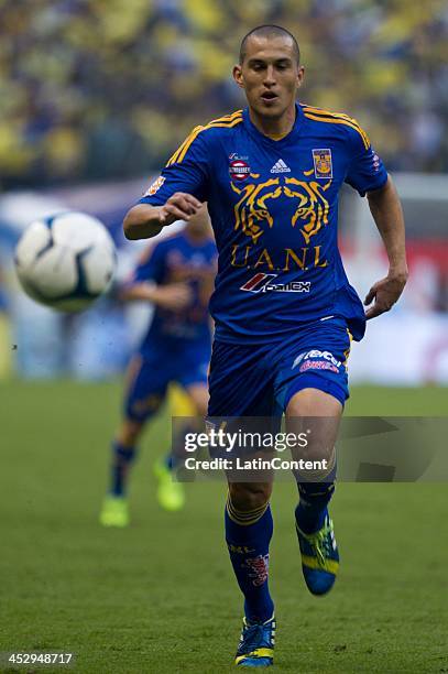 Jorge Torres Nilo of Tigres chases the ball during a Quarterfinals match between America and Tigres UANL as part of the Playoffs Apertura 2013 Liga...