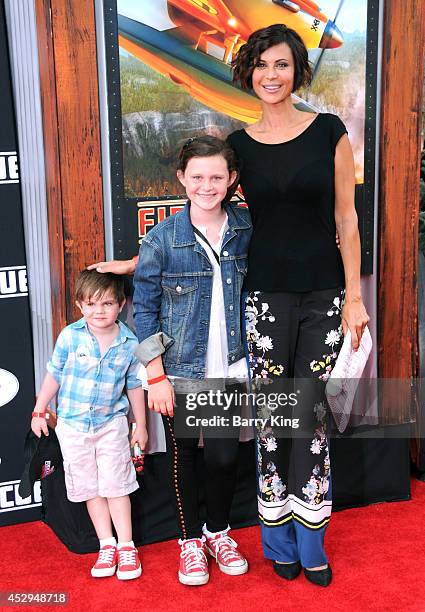 Actress Catherine Bell and children Ronan Beason and Gemma Beason attend the premiere of 'Planes: Fire & Rescue' on July 15, 2014 at the El Capitan...