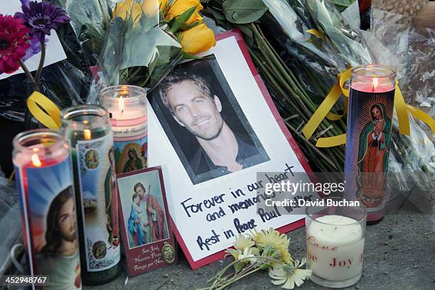 General view of atmosphere as fans pay tribute to actor Paul Walker at the site of his fatal car accident on December 1, 2013 in Valencia,...