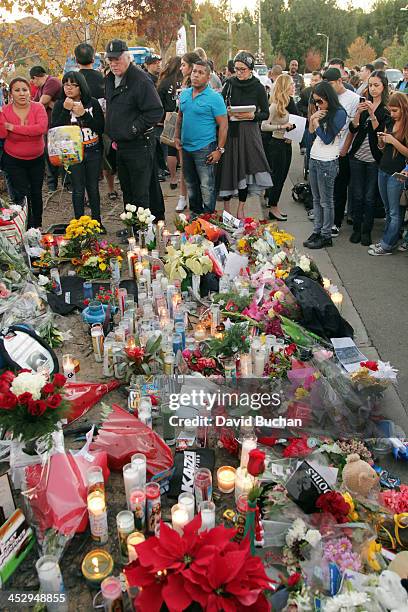 Fans pay tribute to actor Paul Walker at the site of his fatal car accident on December 1, 2013 in Valencia, California. Walker died on November 30,...