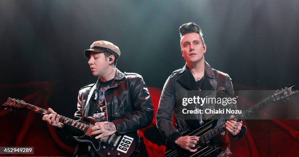 Zacky Vengence and Synyster Gates of Avenged Sevenfold perform at Wembley Arena on December 1, 2013 in London, England.