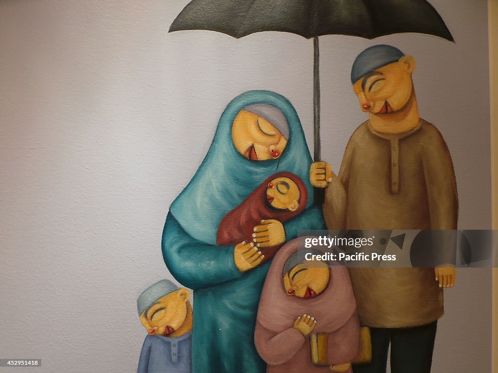 A painting of Aljo Pingol entitled "Happy Family" is...