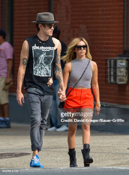 Christopher French and Ashley Tisdale are seen in New York on July 30, 2014 in New York City.