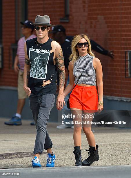 Christopher French and Ashley Tisdale are seen in New York on July 30, 2014 in New York City.