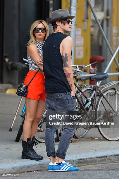 Christopher French and Ashley Tisdale are seen in New York on July 30, 2014 in New York City.