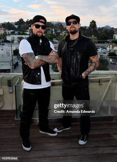 Musicians Benji Madden and Joel Madden pose before performing onstage at the ALT 98.7FM Penthouse Party featuring The Madden Brothers at The Historic...