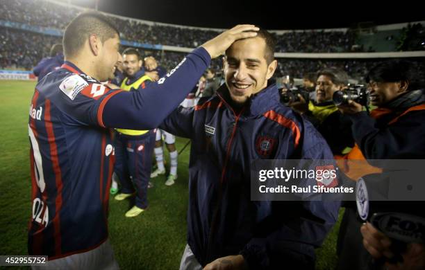 Leandro Romagnoli and Nestor Ortigoza of San Lorenzo celebrate advancing to the final after a second leg semifinal match between Bolivar and San...