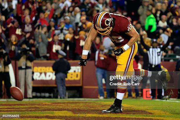 Logan Paulsen of the Washington Redskins celebrates after scoing a touchdown in the second quarter against the New York Giants during their game at...