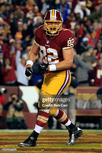 Logan Paulsen of the Washington Redskins celebrates after scoing a touchdown in the second quarter against the New York Giants during their game at...