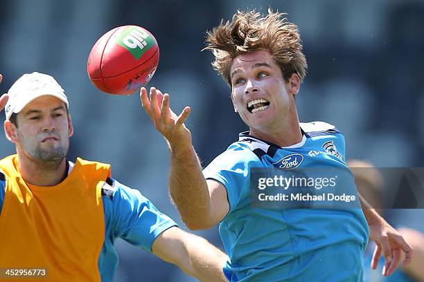 Tom Hawkins and Jared Rivers contest for the ball during a Geelong Cats AFL pre-season training session at Skilled Stadium on December 2, 2013 in...