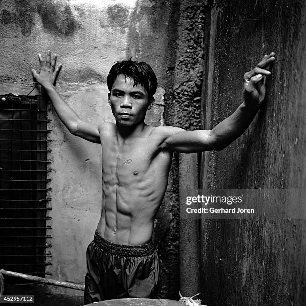 Teenage Manny Pacquiao, the Philippino boxer who went on to become a world champion sensation. He is seen here at the LM Gym in Manila.