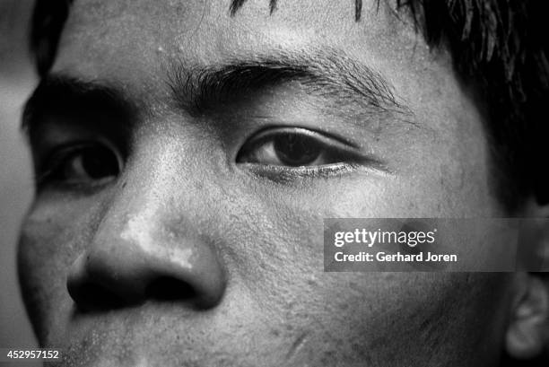 Manny Pacquiao, aged 17, train at LM Gym in Manila. Manny ran away from his impoverished home at the age of 14 in order to lessen the burden of his...