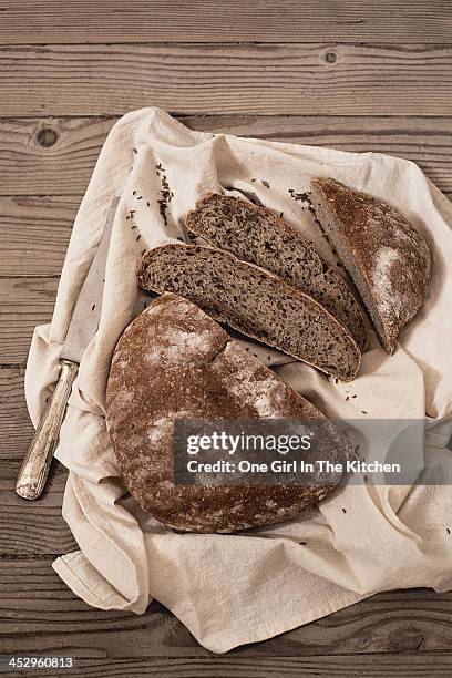puccia rye bread with cumin seeds - rye bread stock pictures, royalty-free photos & images