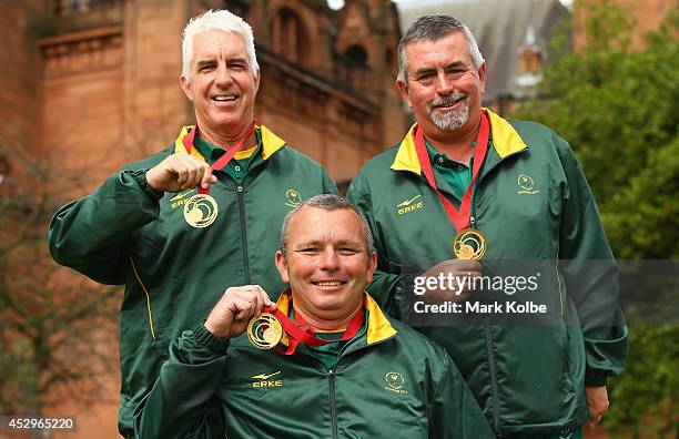 Derrick Lobban, Deon van de Vyver and Roger Hagerty of South Africa pose with their gold medals won in the Para-Sport Open Triples B6/B7/B8 lawn...