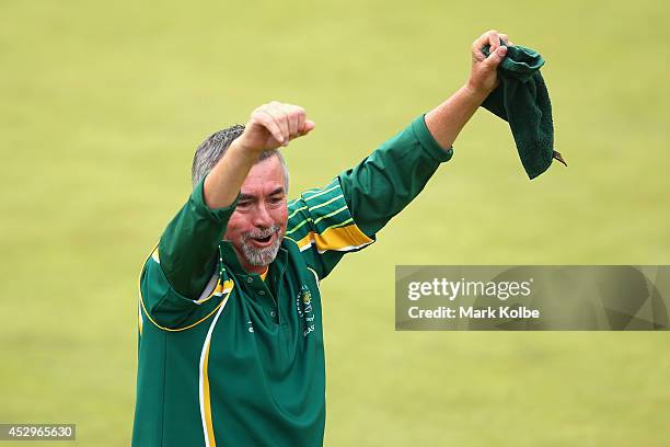 Roger Hagerty of South Africa celebrates their gold medal victory in the Para-Sport Open Triples B6/B7/B8 lawn bowls at Kelvingrove Lawn Bowls Centre...
