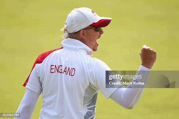 Paul Brown of England celebrates vioctory in the bronze medal Para-Sport Open Triples B6/B7/B8 lawn bowls match between England and Scotland at...