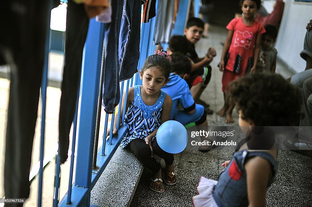 Palestinians taking shelter in an UN school in Gaza