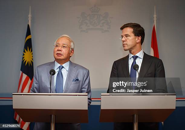 Malaysian Prime Minister Najib Razak makes a statement beside Dutch Prime minister Mark Rutte on July 31, 2014 in The Hague, Netherlands. Razak is in...