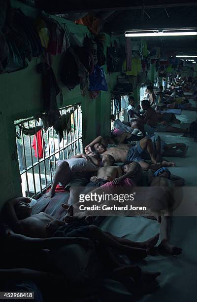 The cell barrack for Batang City Jail gang, one of four gangs in the Manila City Jail. Over 400 people sleep in the barrack. Manila City Jail was...
