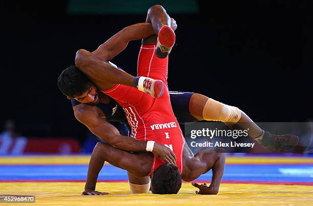 Yogeshwar Dutt of India defeats Chamara Perera of Sri Lanka in the Semi Final of the 65kg Men's Wrestling at Scottish Exhibition And Conference...