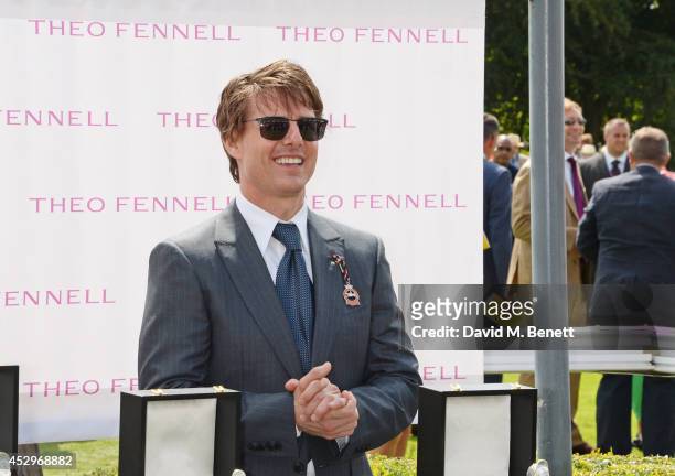 Tom Cruise presents The Magnolia Cup at Glorious Goodwood Ladies Day at Goodwood on July 31, 2014 in Chichester, England.