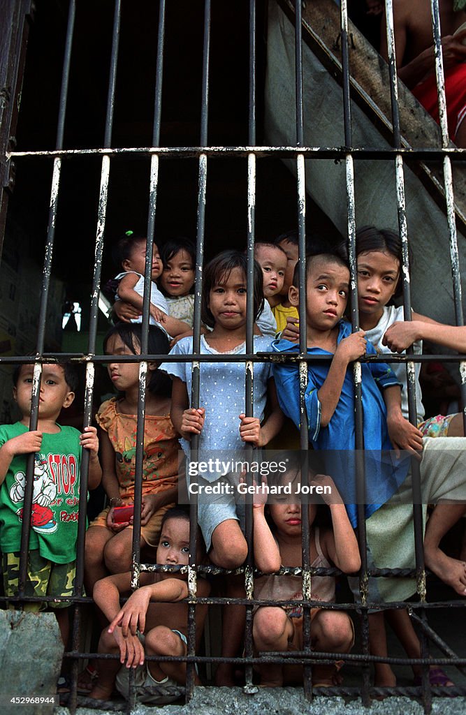 Children during visiting hours at Batang City Jail, one of...