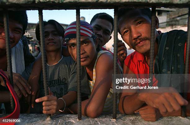 The cell block for Sputnik gang, which holds some 600 inmates. Manila City Jail was built for 800 prisoners by the Spanish in the mid-nineteenth...