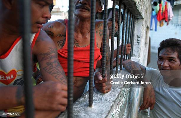 The cell block for Sputnik gang, which holds some 600 inmates. Manila City Jail was built for 800 prisoners by the Spanish in the mid-nineteenth...