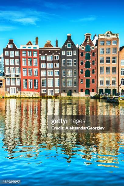 typical dutch houses in the center of amsterdam - gracht amsterdam stock pictures, royalty-free photos & images