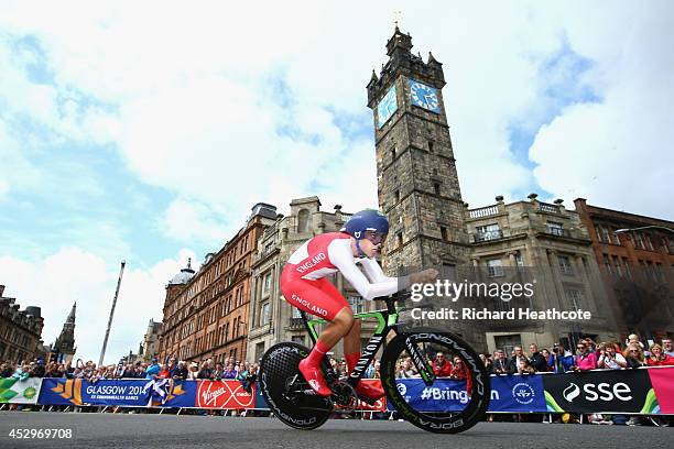 Alex Dowsett of England goes past The Tolbooth during the Men's individual time trial during day eight of the Glasgow 2014 Commonwealth Games on July...