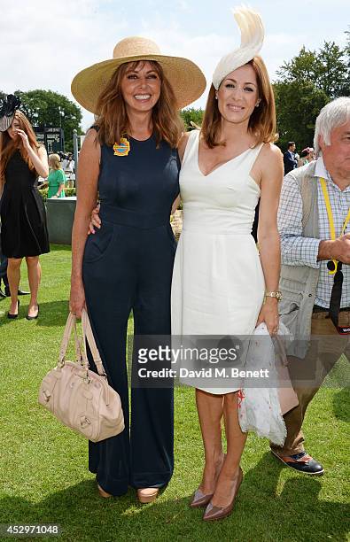 Carol Vorderman and Natalie Pinkham pose in the winners enclosure after the Pioneering Women's Luncheon at Glorious Goodwood Ladies Day at Goodwood...