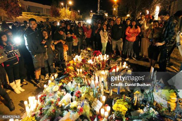 General view of atmosphere as fans pay tribute to actor Paul Walker at crash site on December 1, 2013 in Valencia, California.