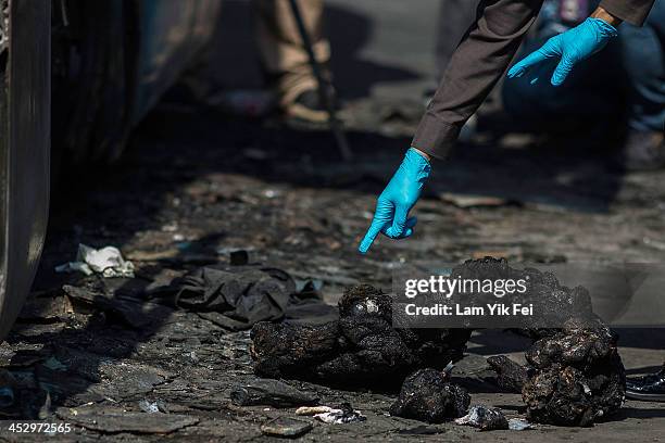 Dead body of a person is burnt with bones remain after Anti-government protesters attack pro-government red shirt supporters at Ramkhamhaeng area on...