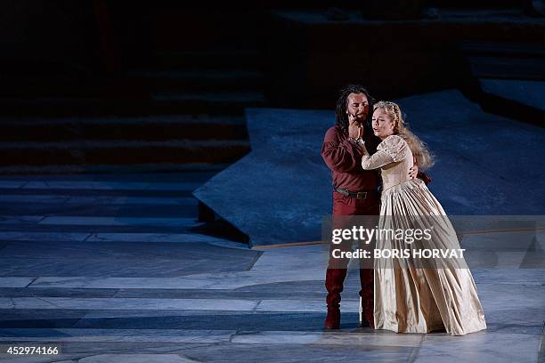 French tenor Roberto Alagna and Albanian soprano Inva Mula as Desdemona perform performs during the rehearsal of the opera "Otello" by Italian...