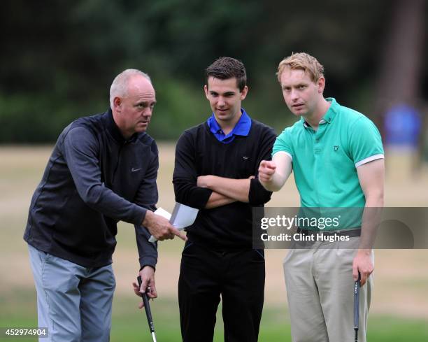 Karl Worby and Alex Boyton of Skidby Lakes Golf Club chat to each other as they wait to play their next shot during the Golfbreaks PGA Fourball...