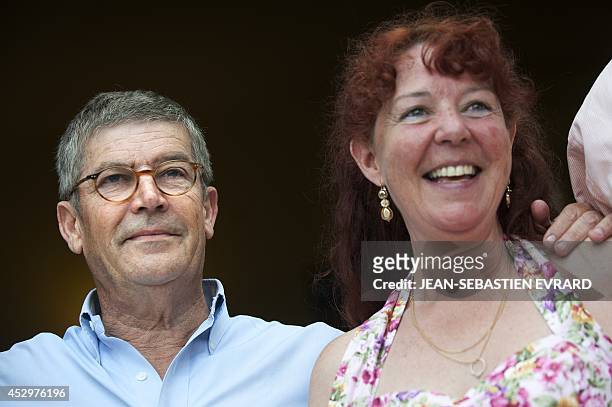 Olivier de Funes, son of late French comedian Louis de Funes, stands with Roselyne Duringer, founder of the Louis de Funes museum, at the Clermont...
