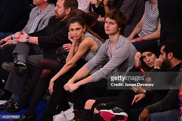 Alejandra Cata and Ansel Elgort attend the New Orleans Pelicans vs New York Knicks game at Madison Square Garden on December 1, 2013 in New York City.
