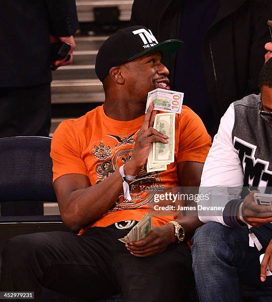 Floyd Mayweather Jr. Attends the New Orleans Pelicans vs New York Knicks game at Madison Square Garden on December 1, 2013 in New York City.