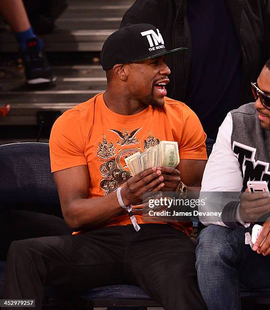 Floyd Mayweather Jr. Attends the New Orleans Pelicans vs New York Knicks game at Madison Square Garden on December 1, 2013 in New York City.