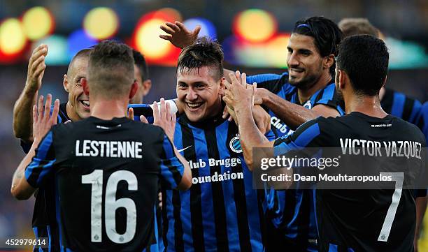 Nicolas Castillo of Brugge celebrates scoring the second goal of the game with team mates during the UEFA Europa League 3rd qualifying round first...