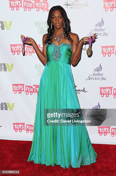 Olympic medalist DeeDee Trotter attends the Hollywood Christmas Parade benefiting the Toys for Tots Foundation on December 1, 2013 in Hollywood,...