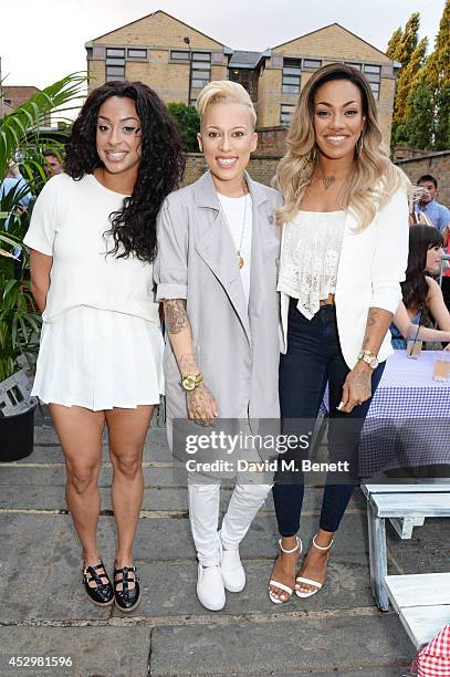 Alexandra Buggs, Courtney Rumbold and Karis Anderson of Stooshe attend the star studded VIP launch party for truTV, a brand new larger than life TV...