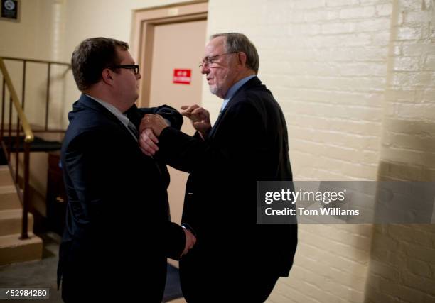 Rep. Don Young, R-Alaska, confronts an aide who tried to stop him from entering the side door of a House Republican meeting in the Capitol, July 31,...